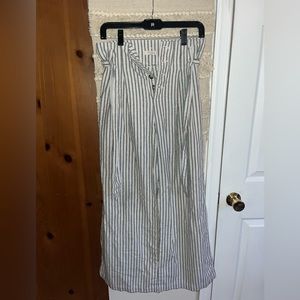 Striped wide-leg pants, buttoned up with belt